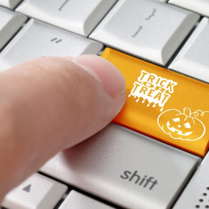 keyboard with trick or treat button indicating e-commerce holiday sales